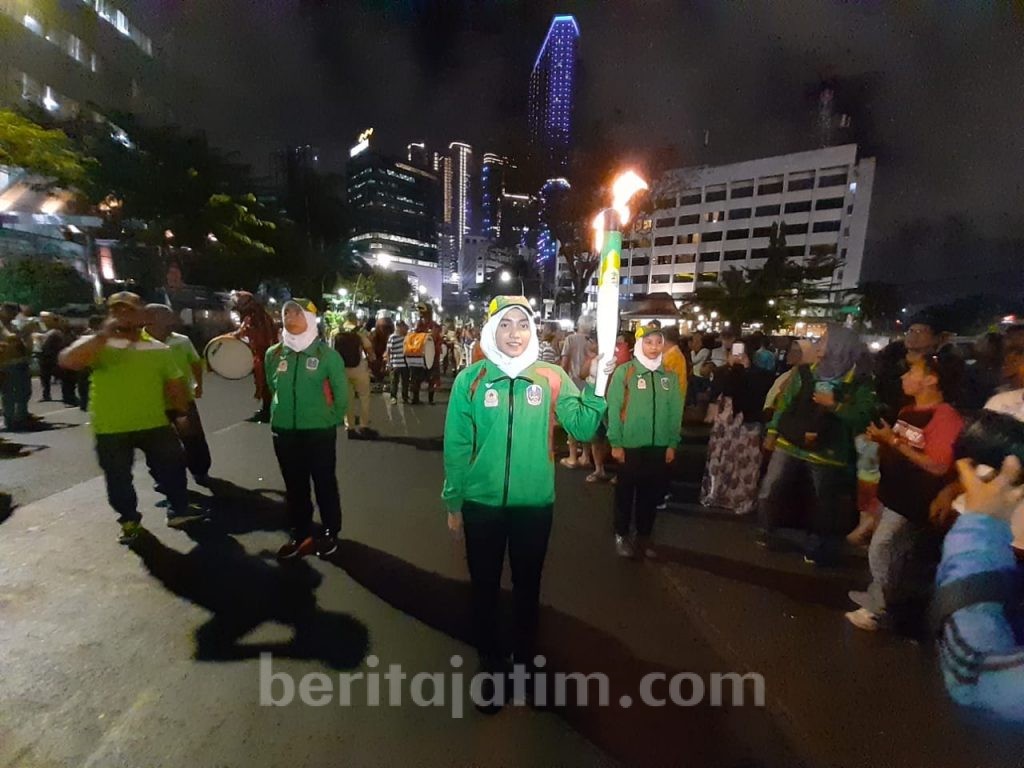 Sampai di Surabaya, Obor Kirab Porprov 2019 Disambut Suka Cita