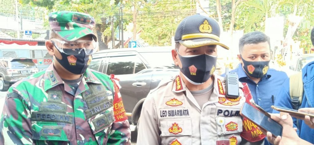 Polisi Tetapkan AS Sebagai Tersangka Karena Cium Jenazah Covid-19