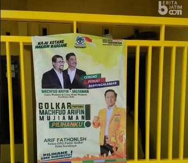 Dukungan Total, Konstituen Golkar Pasang Spanduk Machfud Arifin-Mujiaman di Pagar Rumah