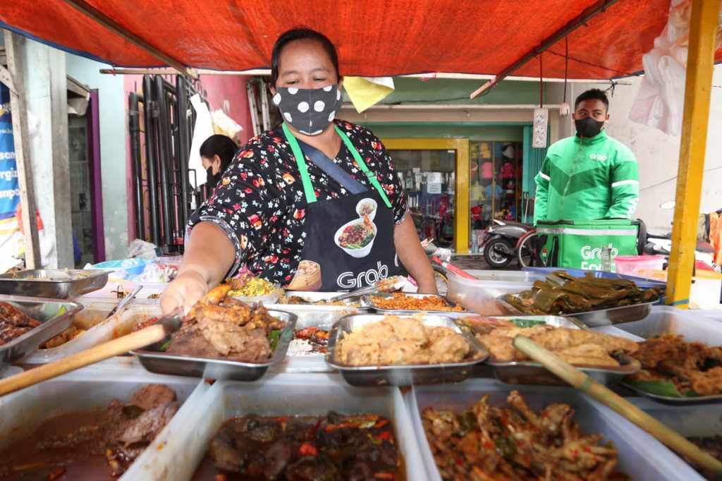 Eni Pedagang Warung Nasi Kuning Yang Sukses Berkat Bumbu Rahasia