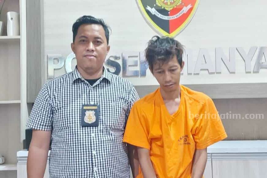pelaku curanmor tertunduk lesu setelah diamankan di Polsek Manyar Gresik