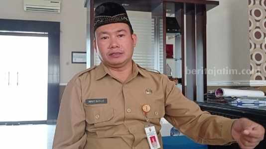 Kepala Dispendukcapil Kabupaten Mojokerto, Amat Susilo. [Foto : ist]