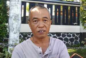 Agus Purwoko (66), Ketua Komunitas Driver Online Malang Selatan (OMS), Jumat (9/6/2023).