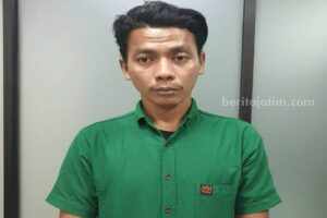 Irwan Junaedi saat diamankan di Satreskim Polrestabes Surabaya. (Foto/ist)