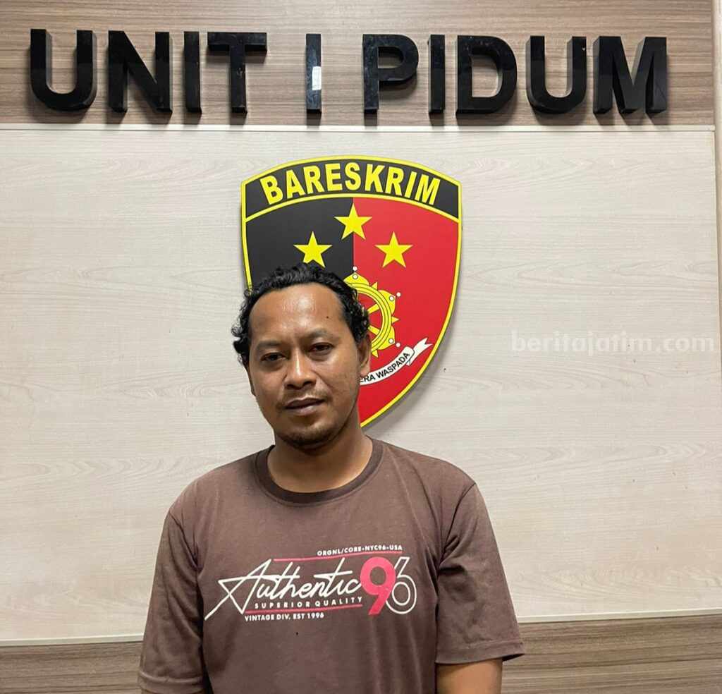 Mahmudi pelaku judi online saat diamankan polisi