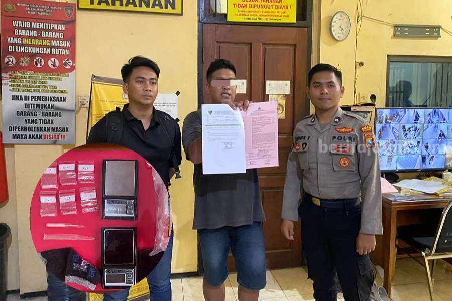Foto : Tersangka Didik Hariyanto (35) setelah diamankan Polres Pasuruan beserta barang buktinya.