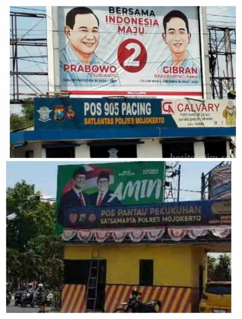 Caption : Dua baliho APK milik pasangan Prabowo-Gibran dan Anies-Muhaimin yang dipasang di atas kantor pos polisi. [Foto : ist]