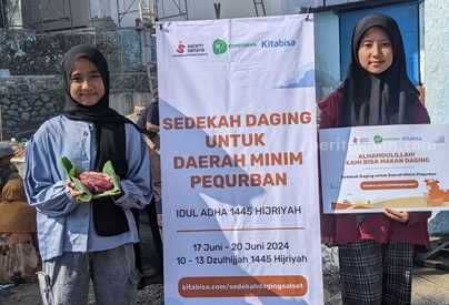 Peternak Muda Wonosalam Jombang Bagikan Ratusan Kambing Kurban foto beritajatim