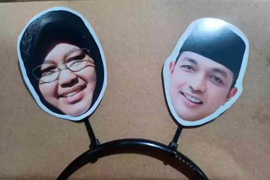 Kandidat Pilkada Jatim 2024, Tri Rismaharini dan Gus Hans.