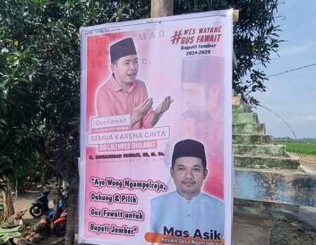 Pasang Banner Cabup Jember Fawait, Kades Ngampelrejo Langgar UU Desa