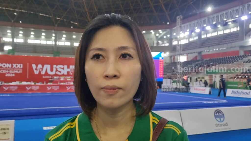 Sherly, Pelatih Wushu Jatim.