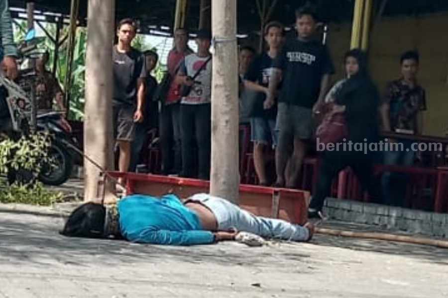 Korban dengan posisi tengkurap diatas paving