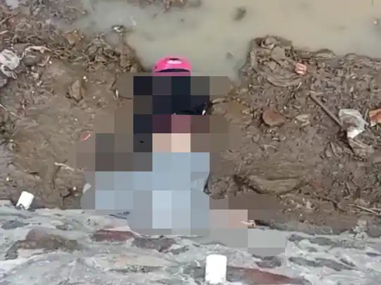 Penemuan Jasad Wanita Berhelm Pink di Sungai Pasuruan, Identitas Terungkap Warga Probolinggo Foto BeritaJatim.com